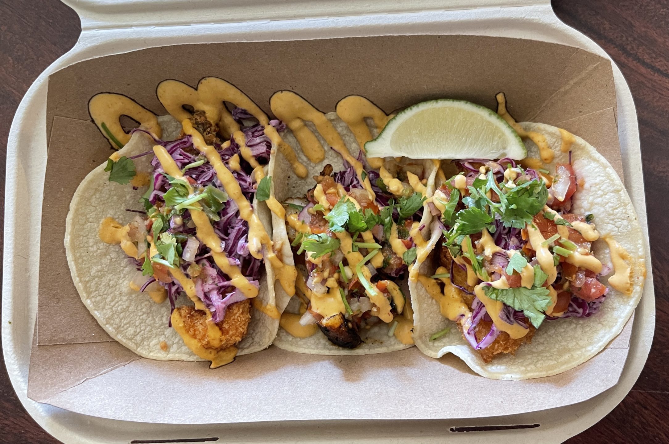Three fish tacos in a to-go container from Deckhand Dave's in Juneau