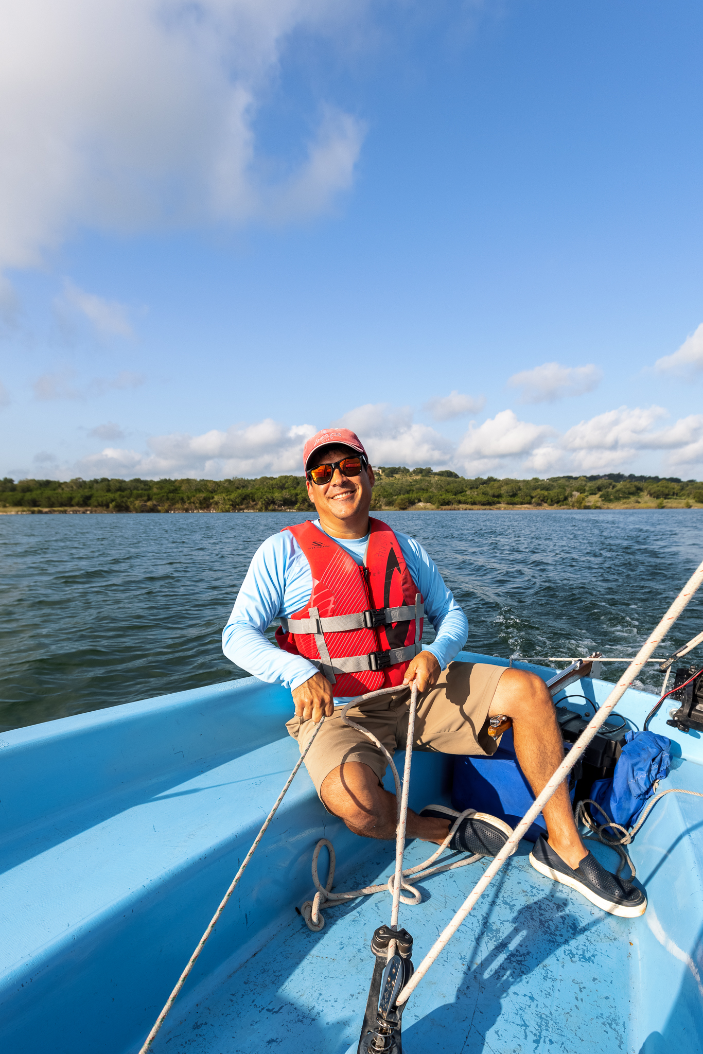 Captain Chapa of Trisum Sailing on a sailboat on Boerne Lake