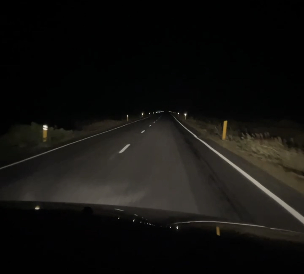 Driving on the Ring Road in Iceland at night.